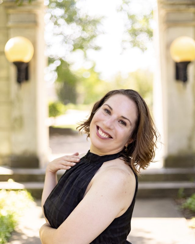 Francesca Merritt smiling, close portrait